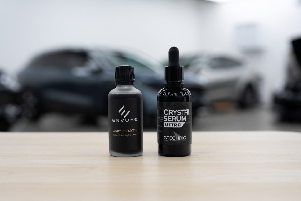 Envoke graphene coating and Gtechniq Crystal Serum Ultra bottles side by side
