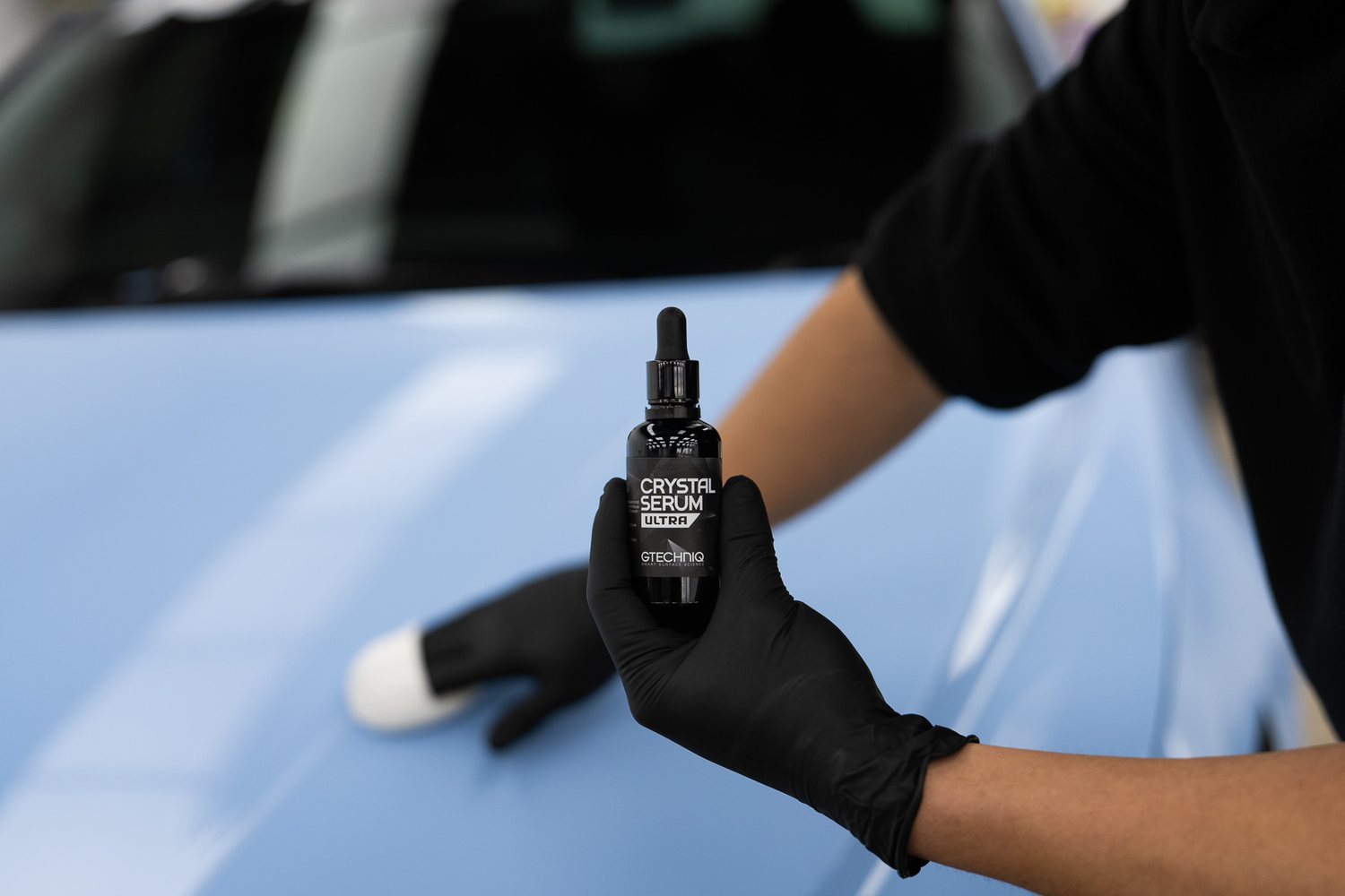 Ceramic coating being applied with an applicator block