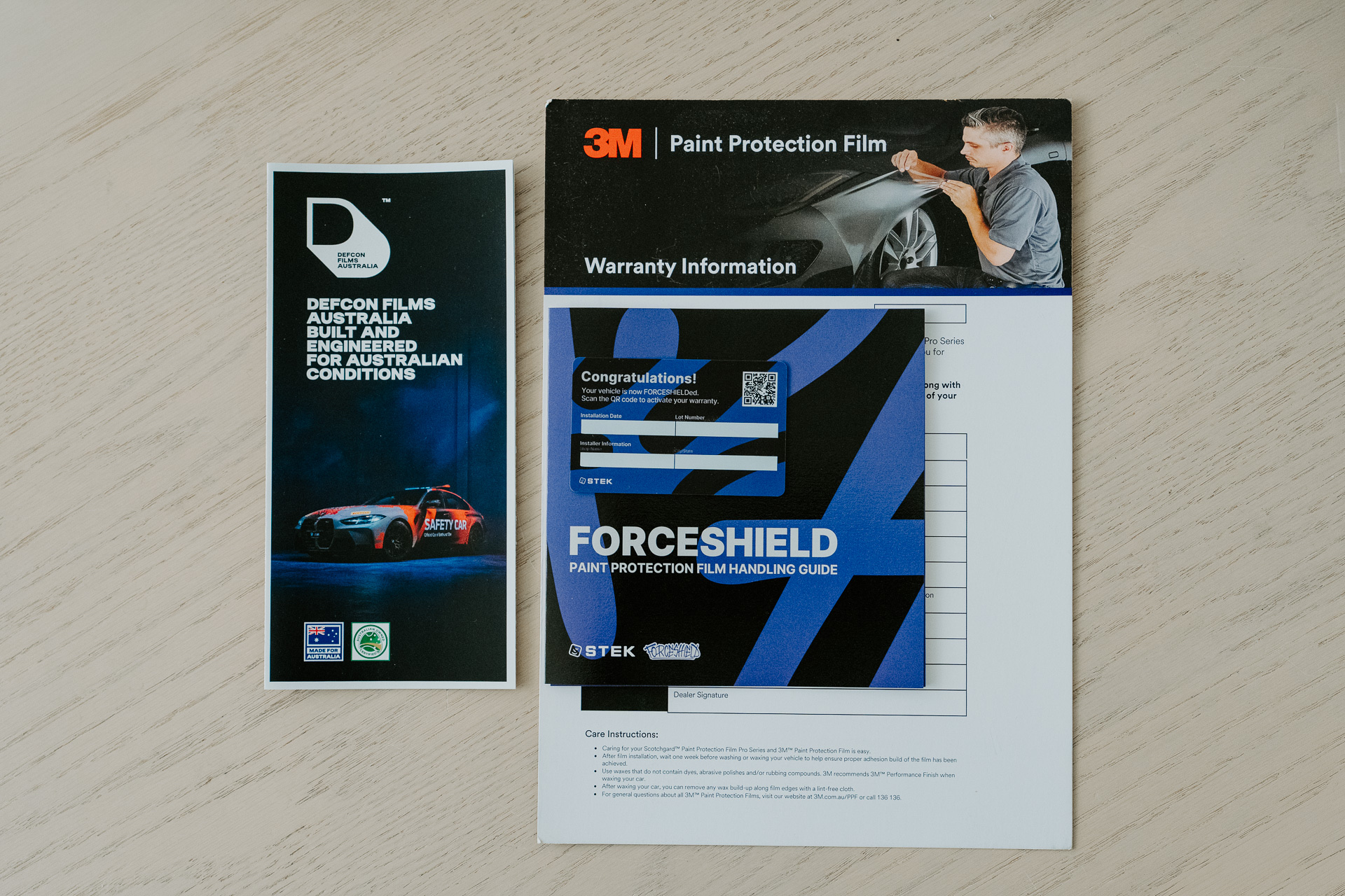 Defcon and 3M paint protection film warranty certificates