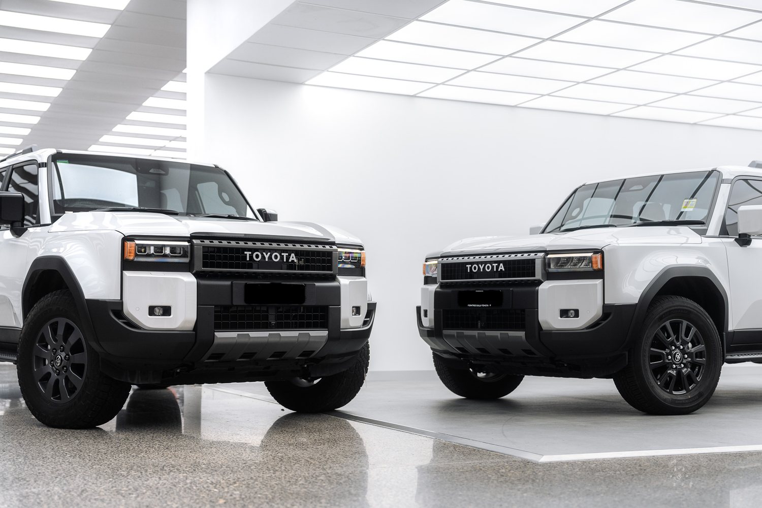 Customer cars in the Liquid R workshop