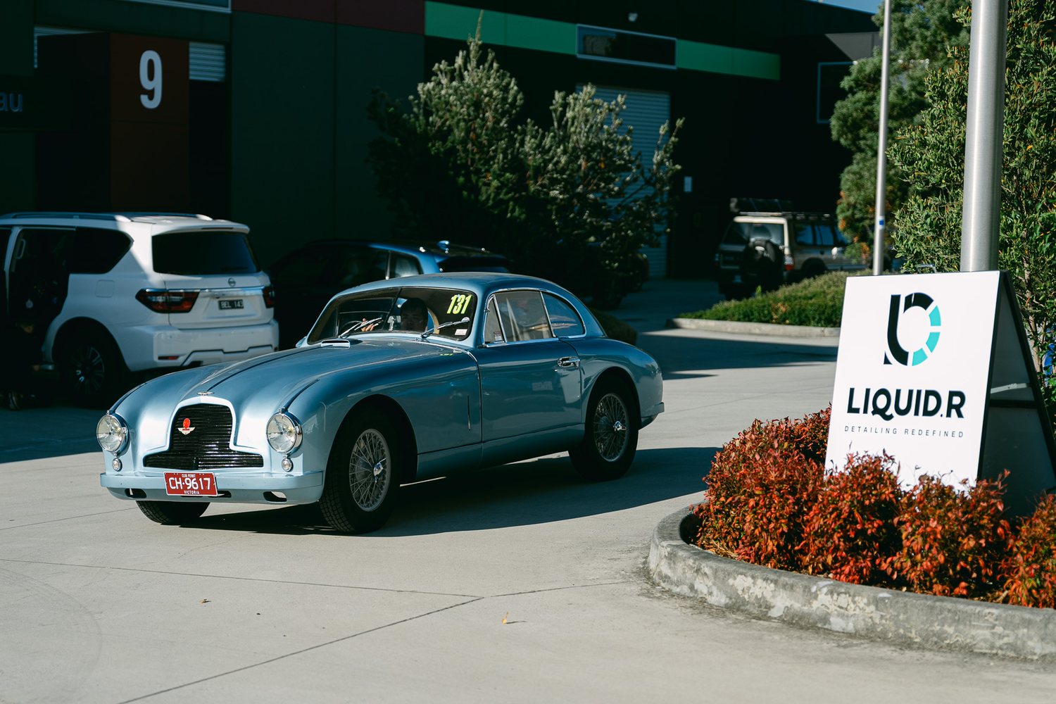 Customer cars in the Liquid R workshop