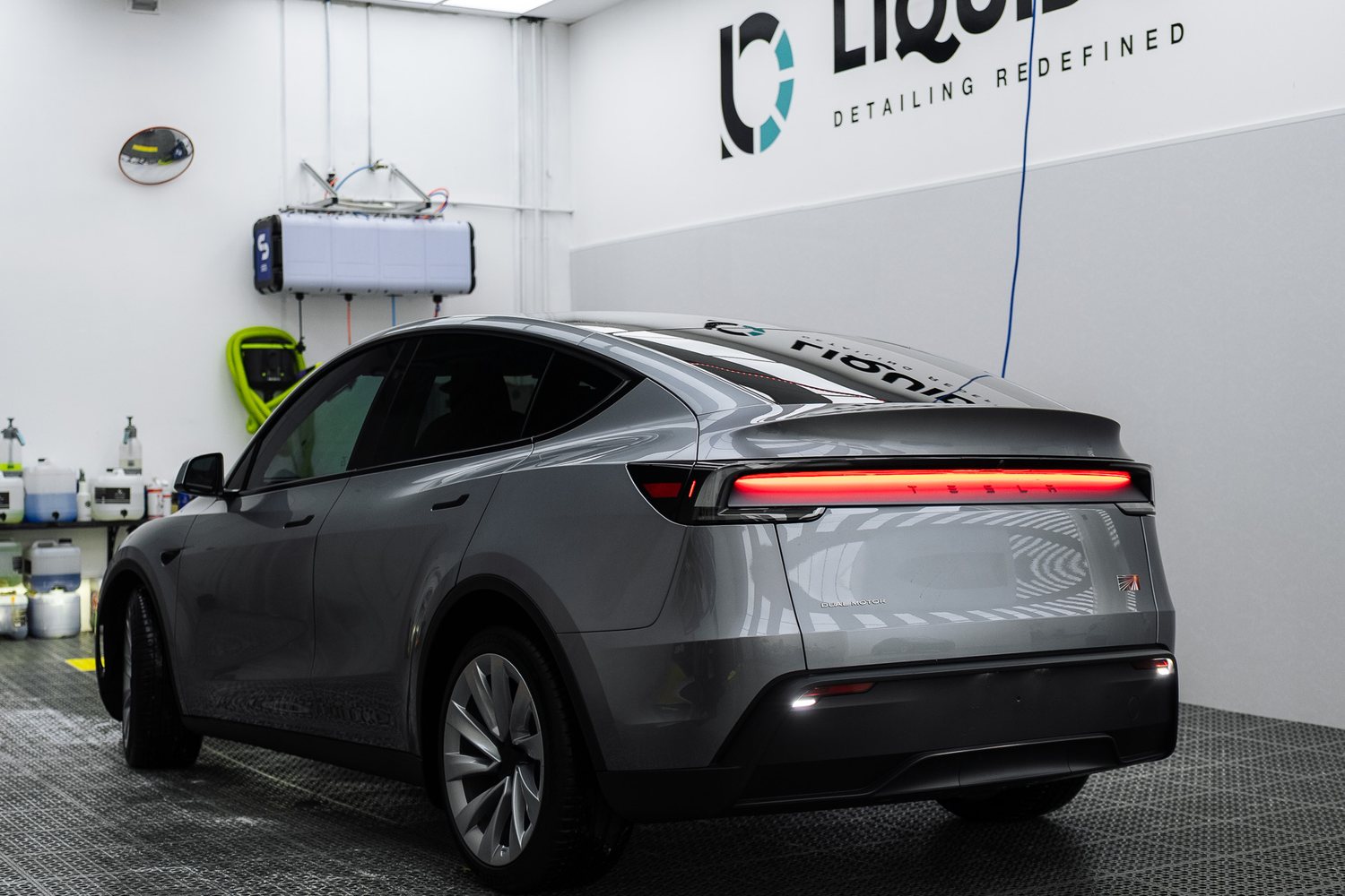 Customer cars in the Liquid R workshop