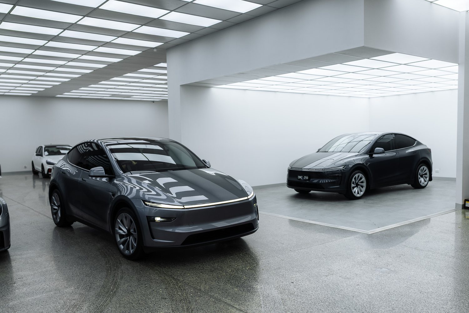 Customer cars in the Liquid R workshop