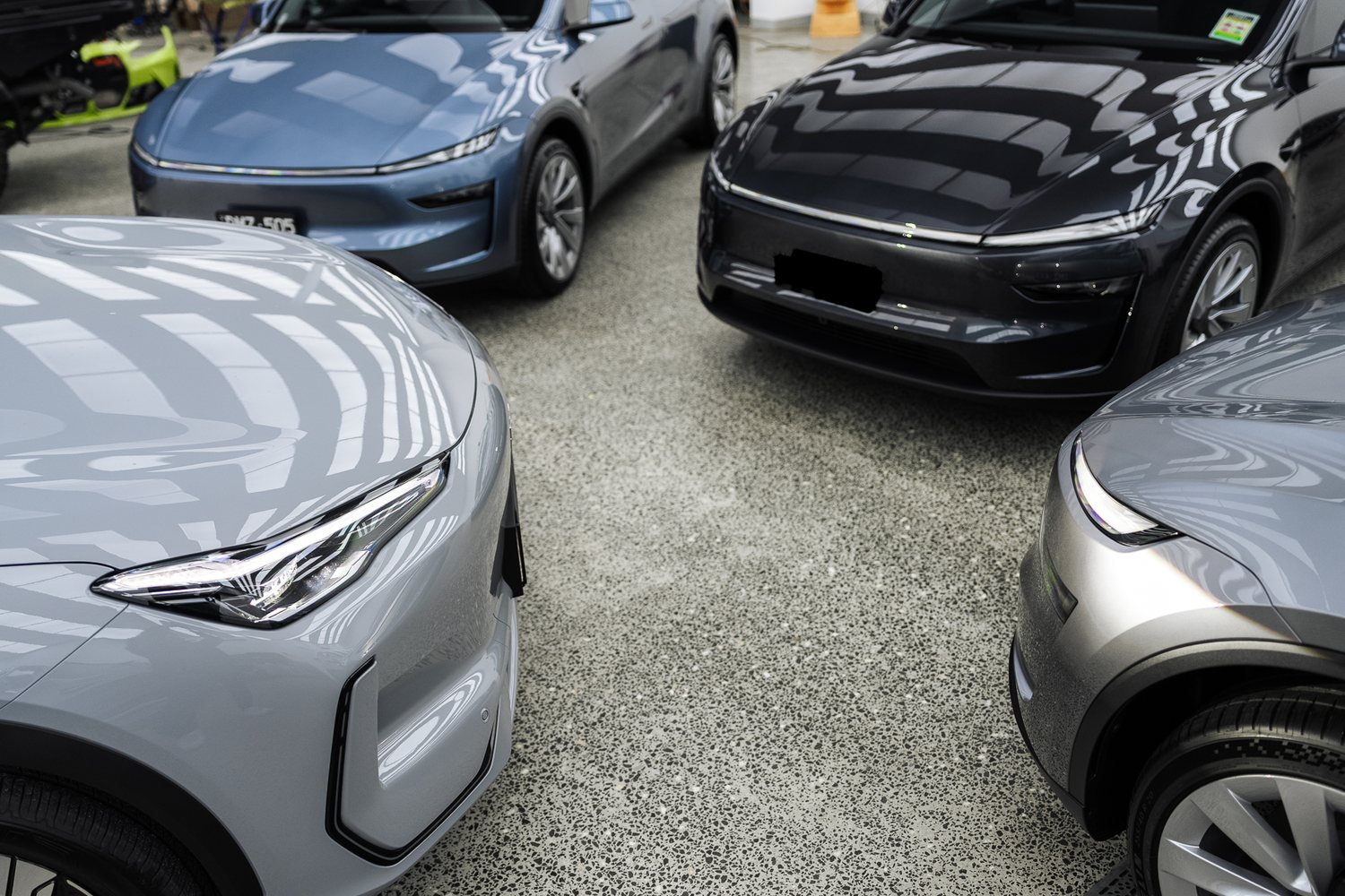 Customer cars in the Liquid R workshop