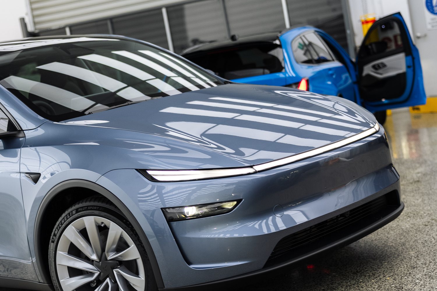 Customer cars in the Liquid R workshop
