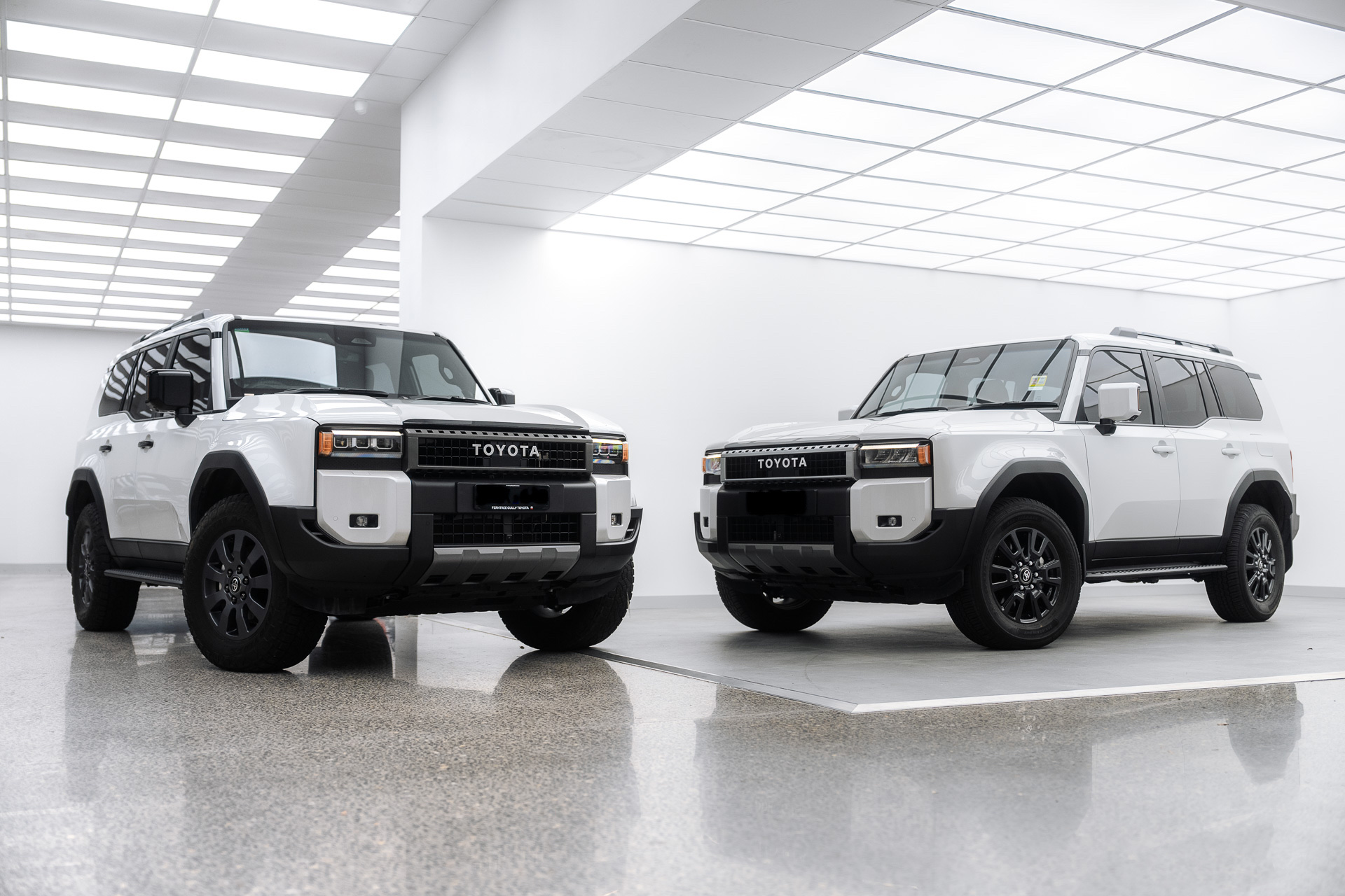 Two Toyota LandCruiser Prados in the Liquid R studio