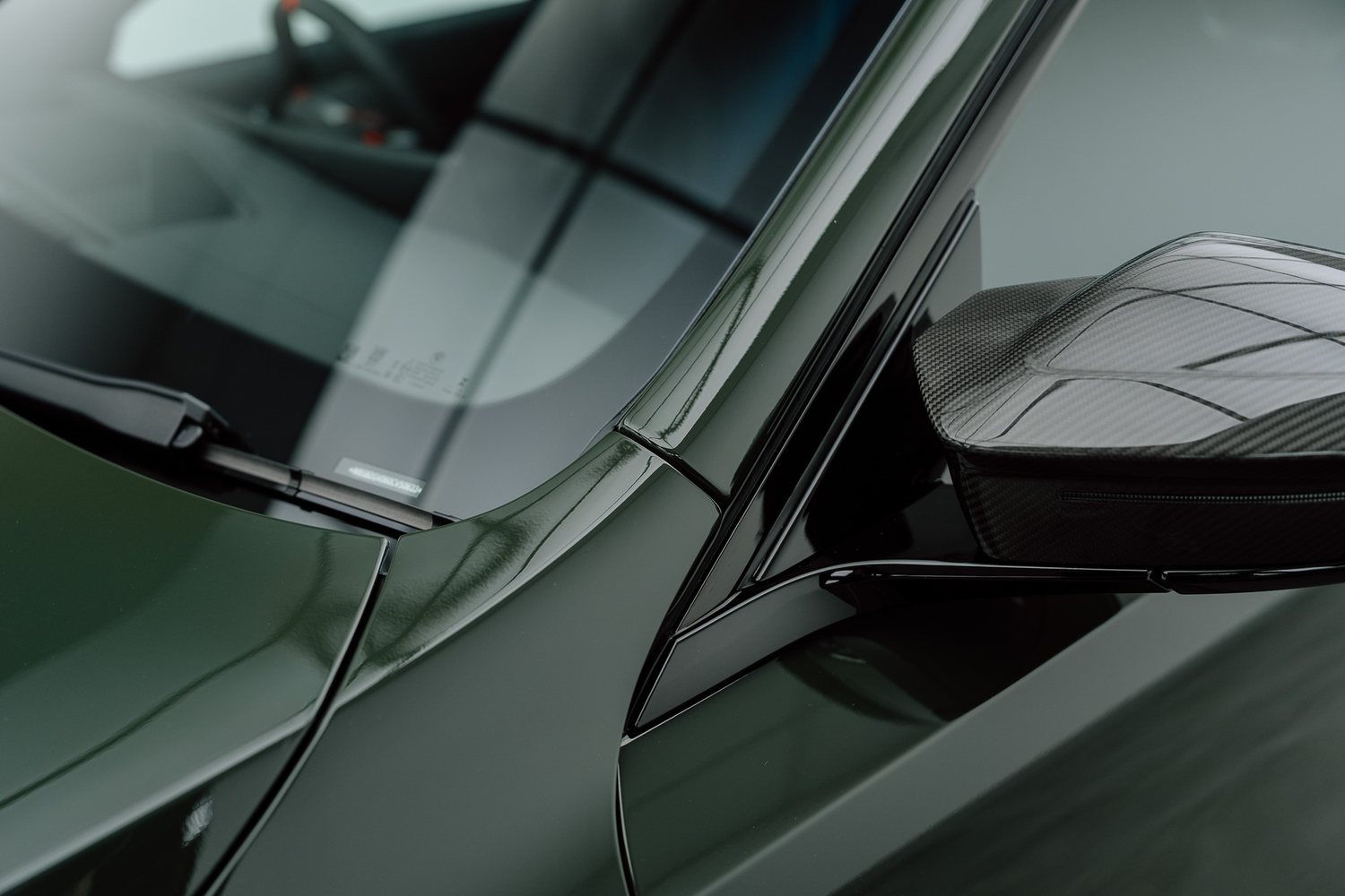 Door and mirror detail on a BMW M5 Touring