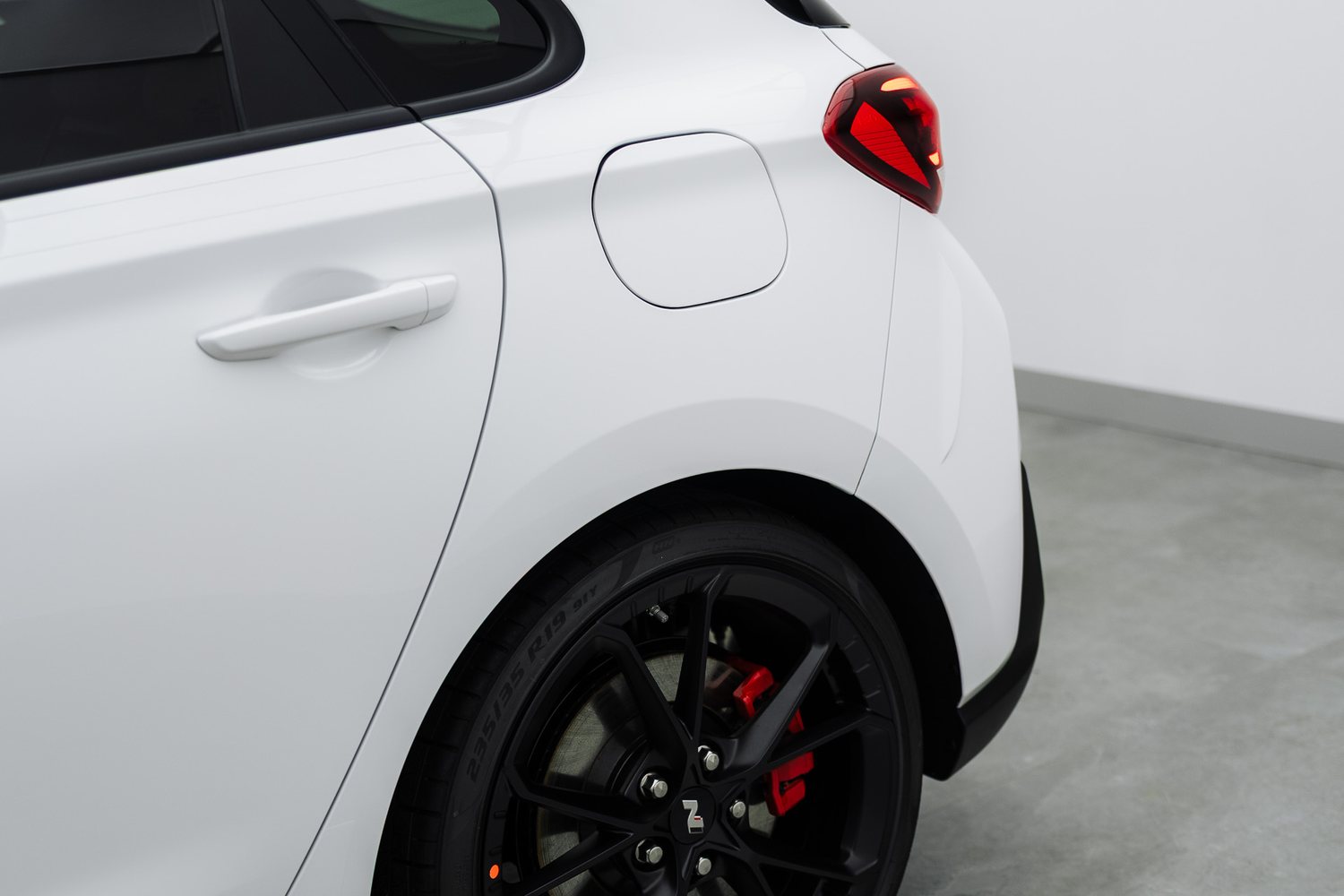 Door and mirror detail on a white Hyundai i30 N