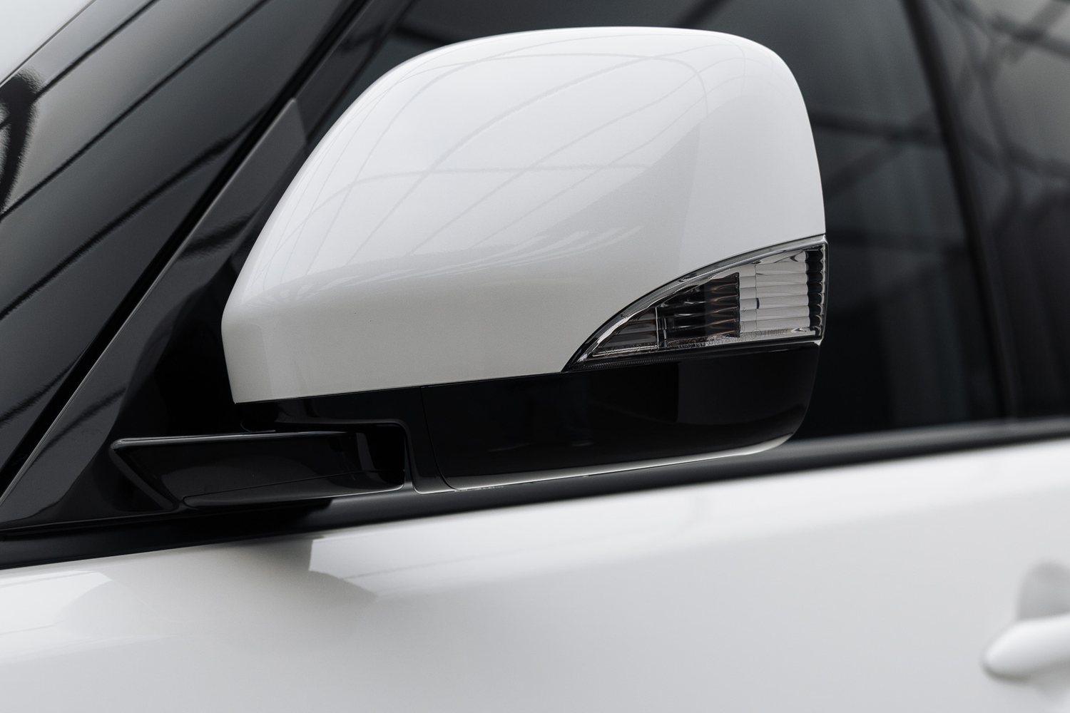 Door and mirror detail on a white Nissan Patrol