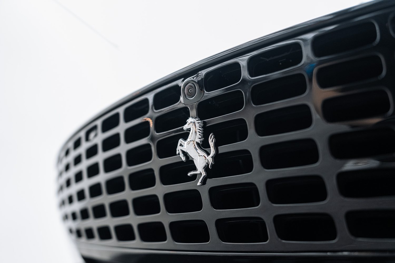 Front end of a black Ferrari Roma