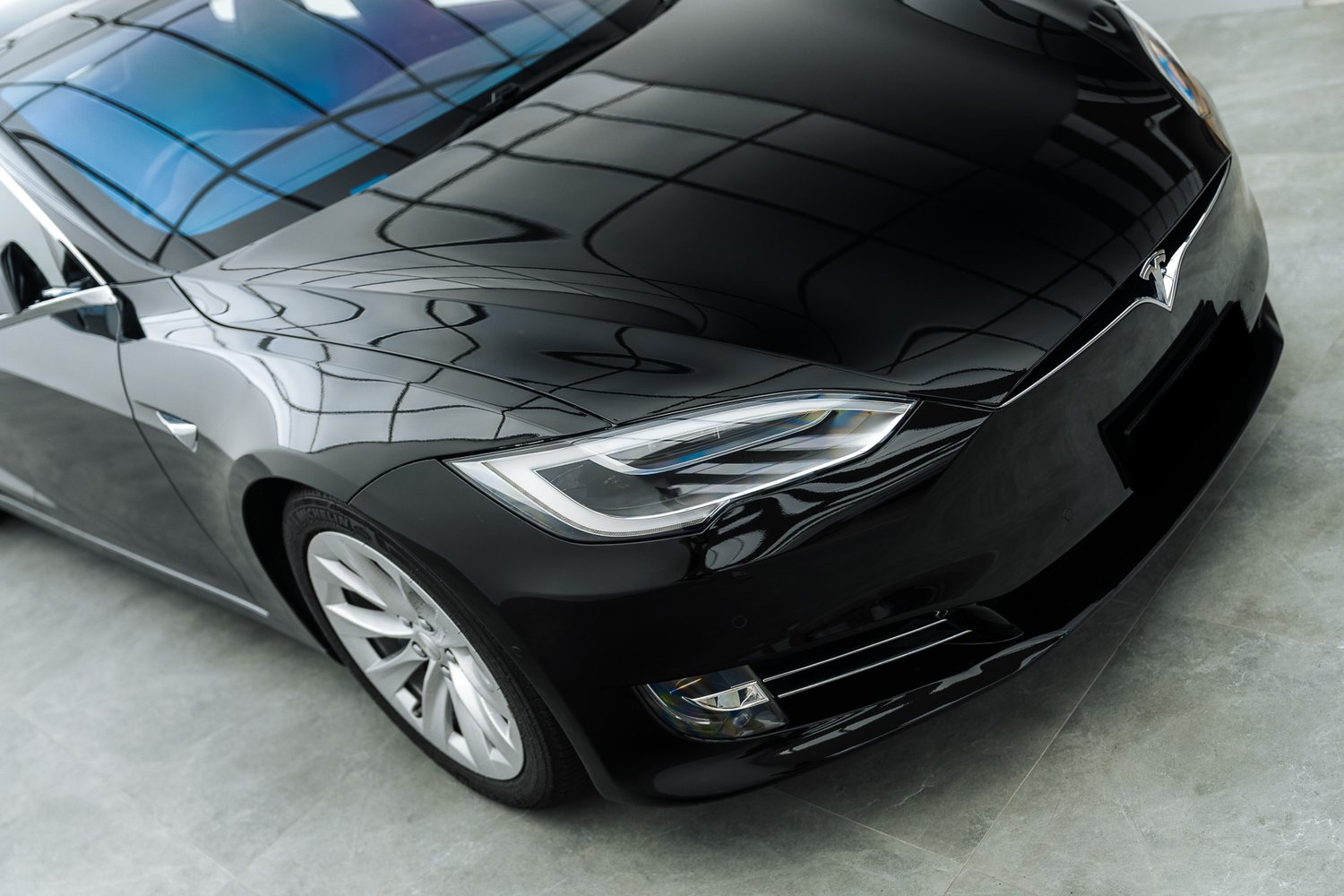 Front end of a black Tesla Model S