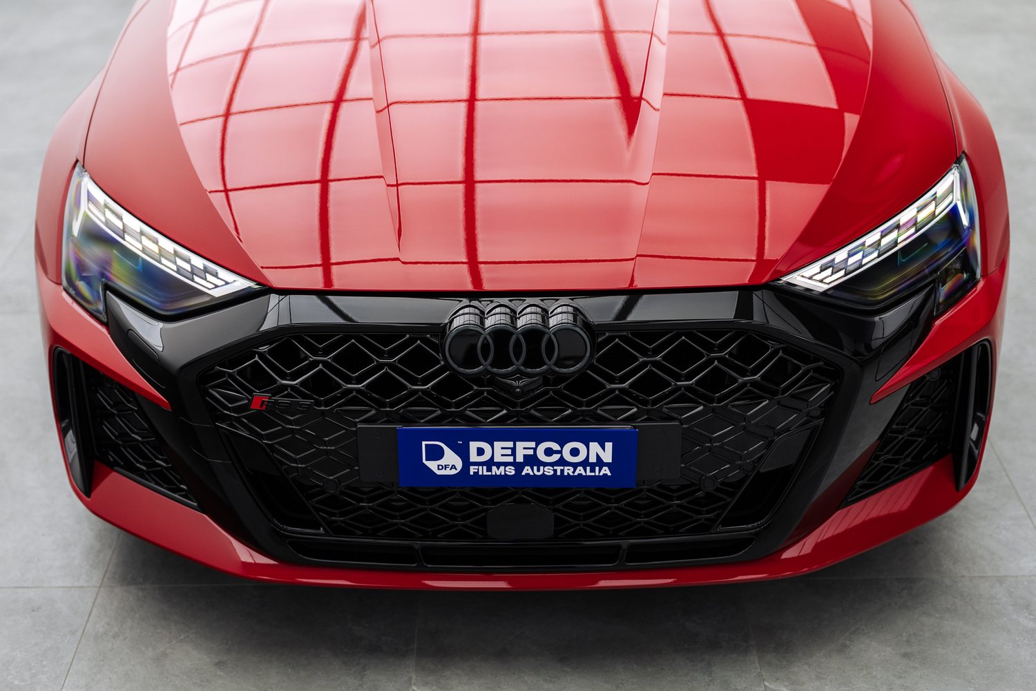 Front end of a red Audi RS3