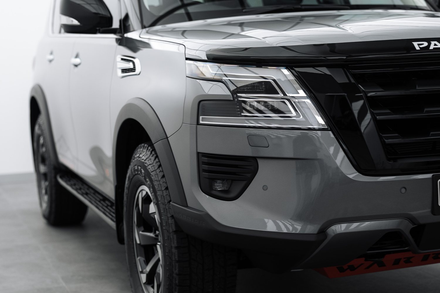 Front end of a silver Nissan Patrol