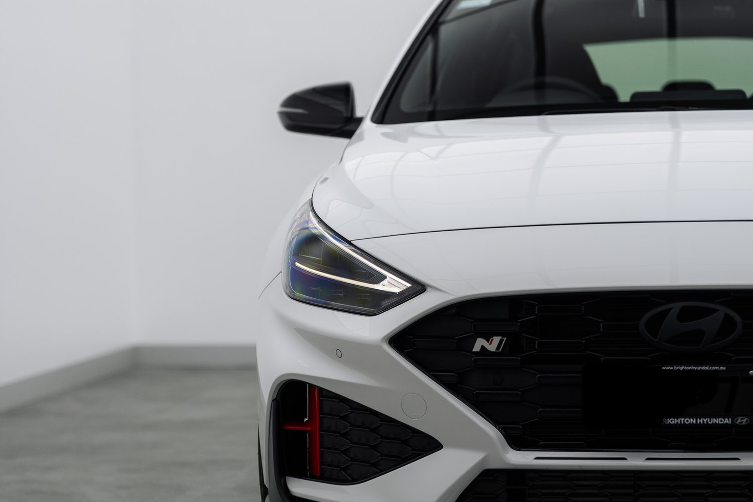 Front end of a white Hyundai i30 N