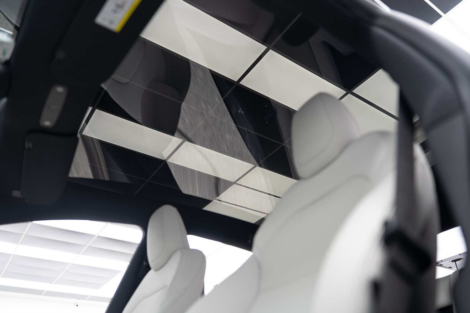 Glass roof seen from inside a Tesla