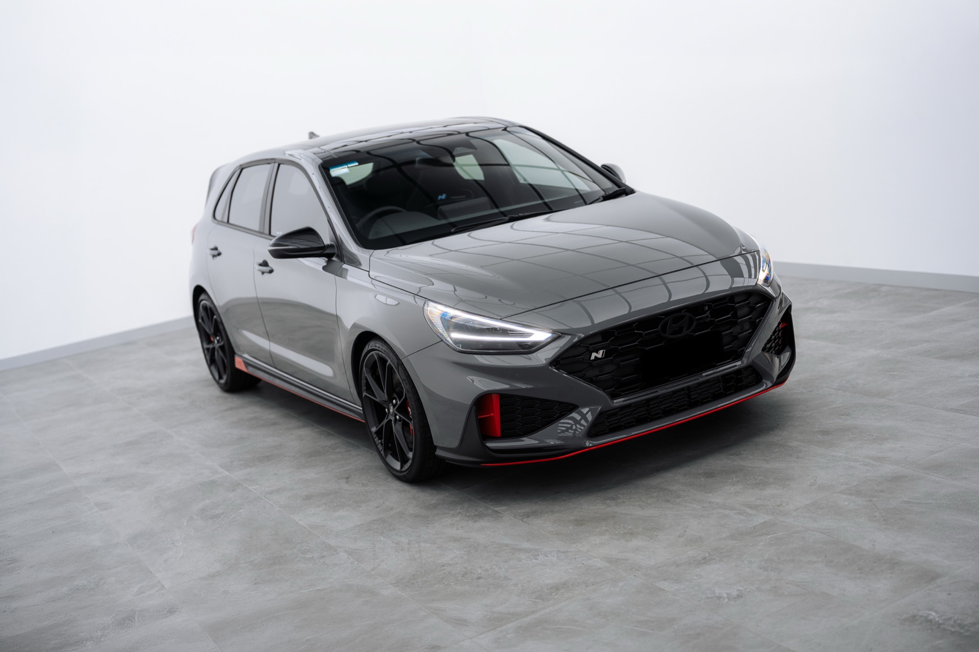 Grey Hyundai i30 N hatch in the Liquid R studio