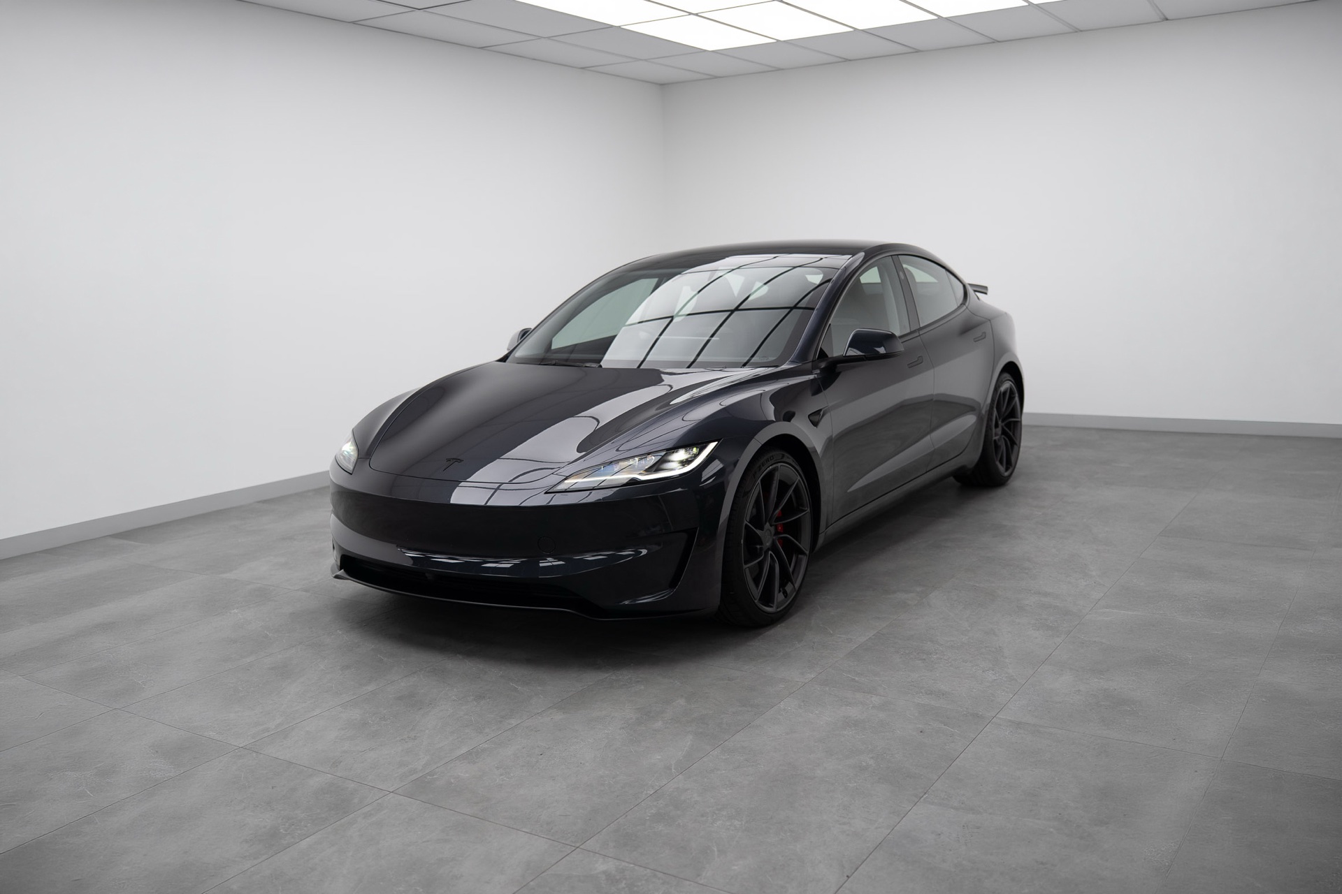 Black Tesla Model 3 in the Liquid R studio