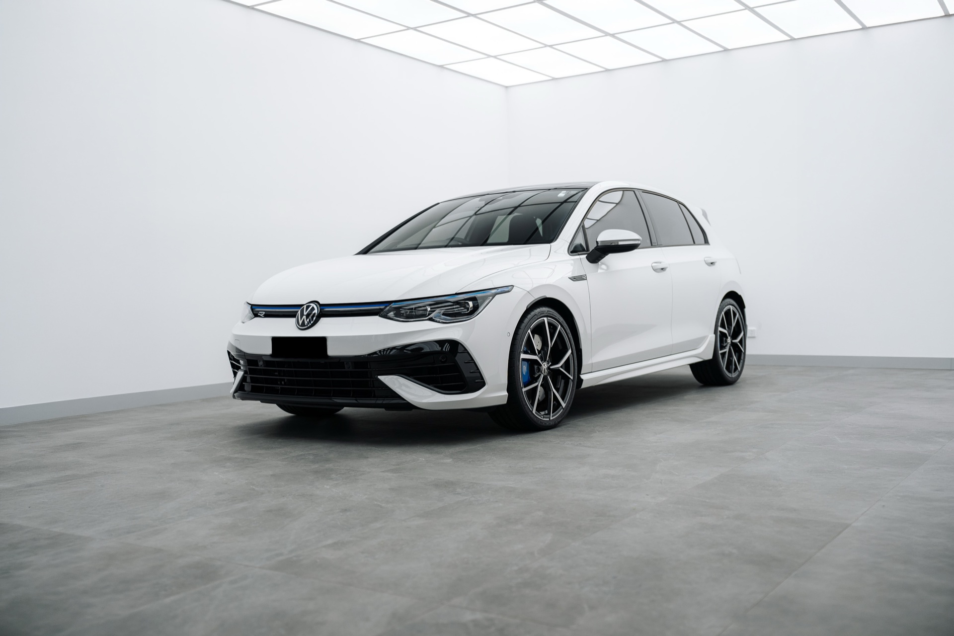 White Volkswagen Golf R in the Liquid R studio