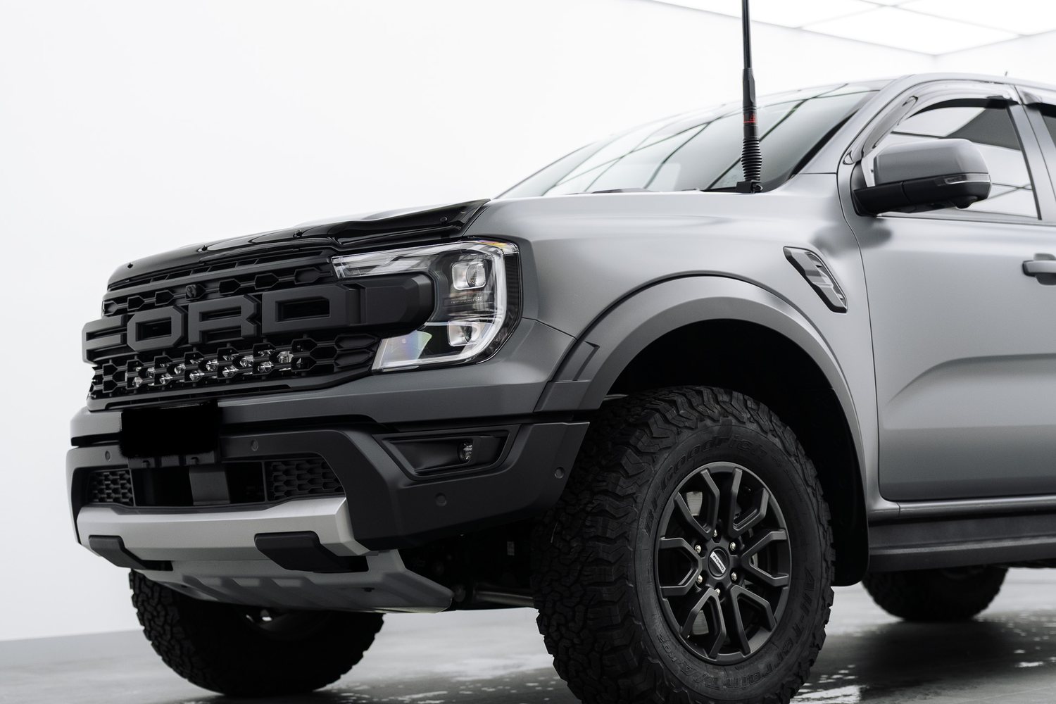 Matte grey Ford Ranger Raptor in the Liquid R studio