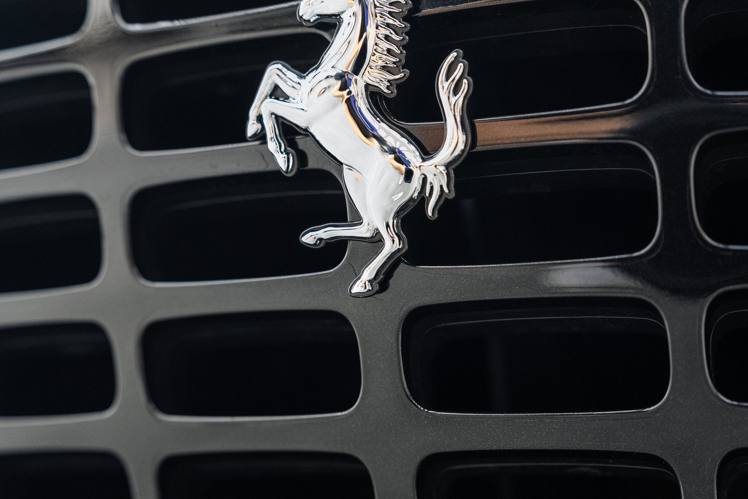 Paintwork detail on a black Ferrari Roma