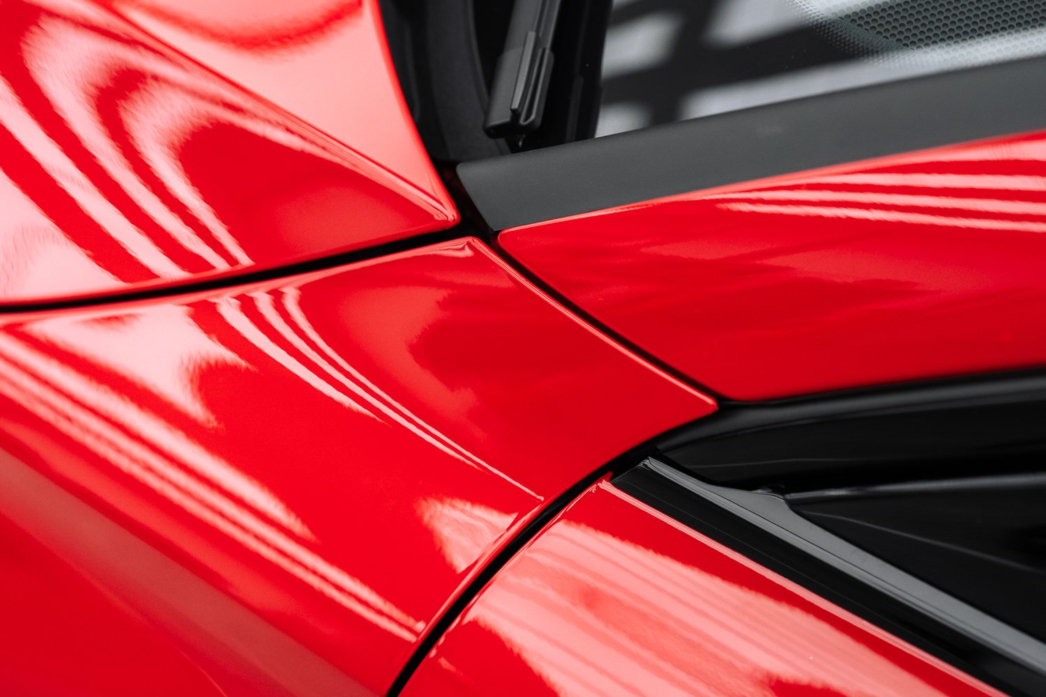 Paintwork detail on a red Audi RS3