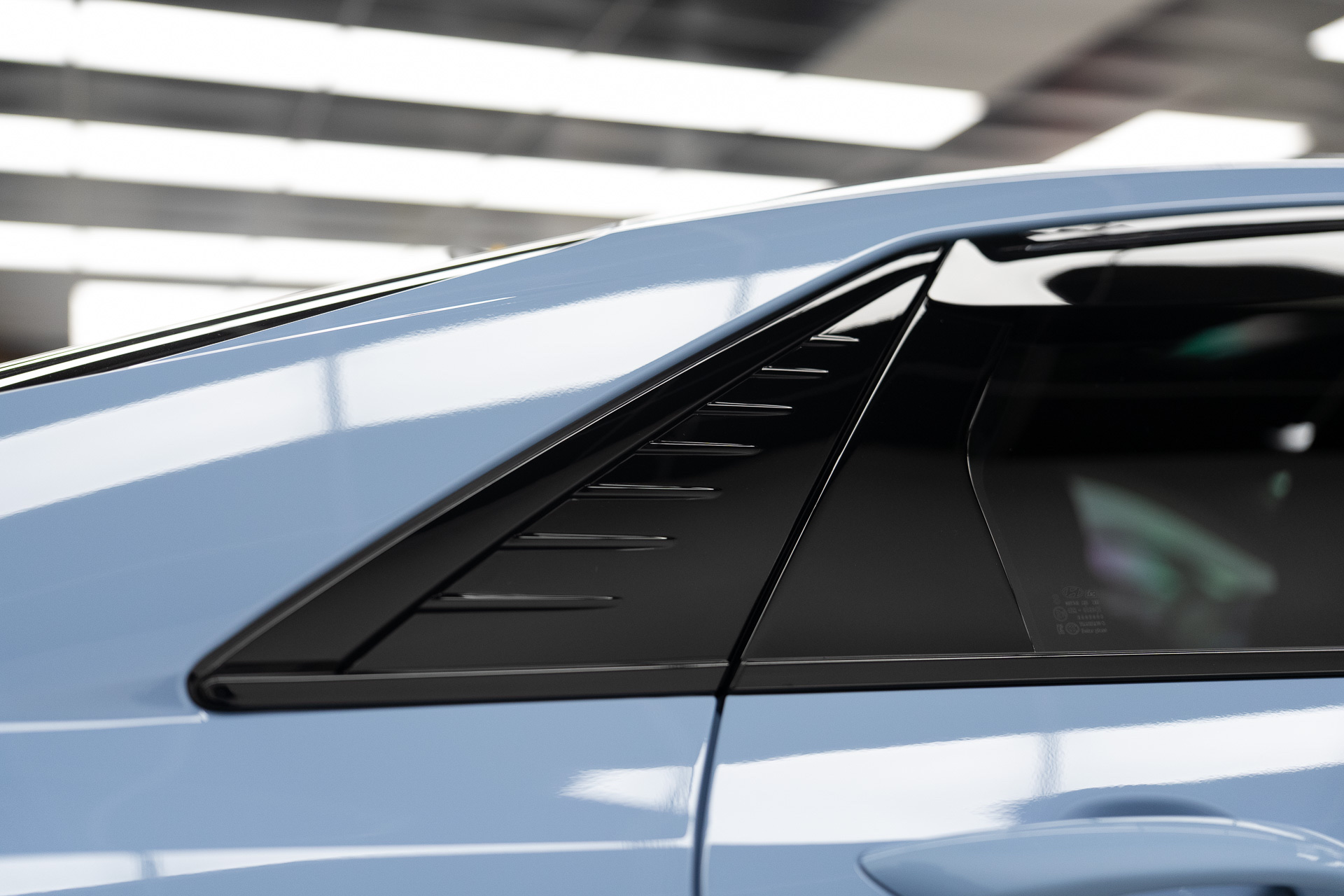 Light blue Porsche door and quarter panel edge