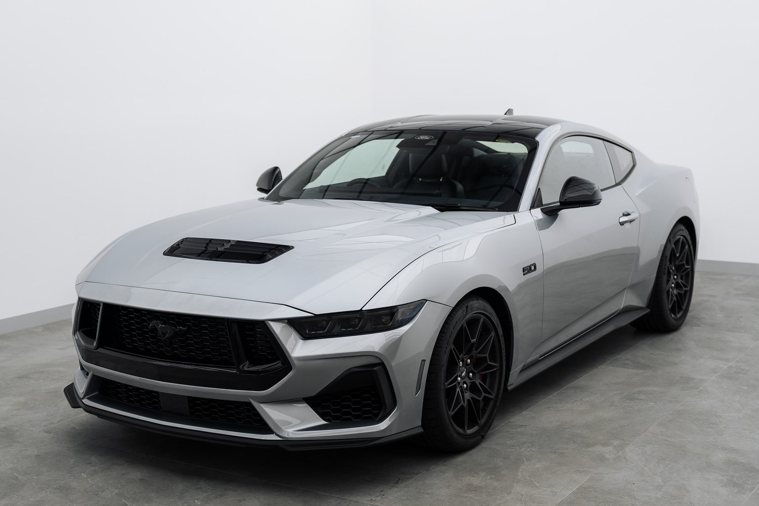 Silver Ford Mustang in the Liquid R studio