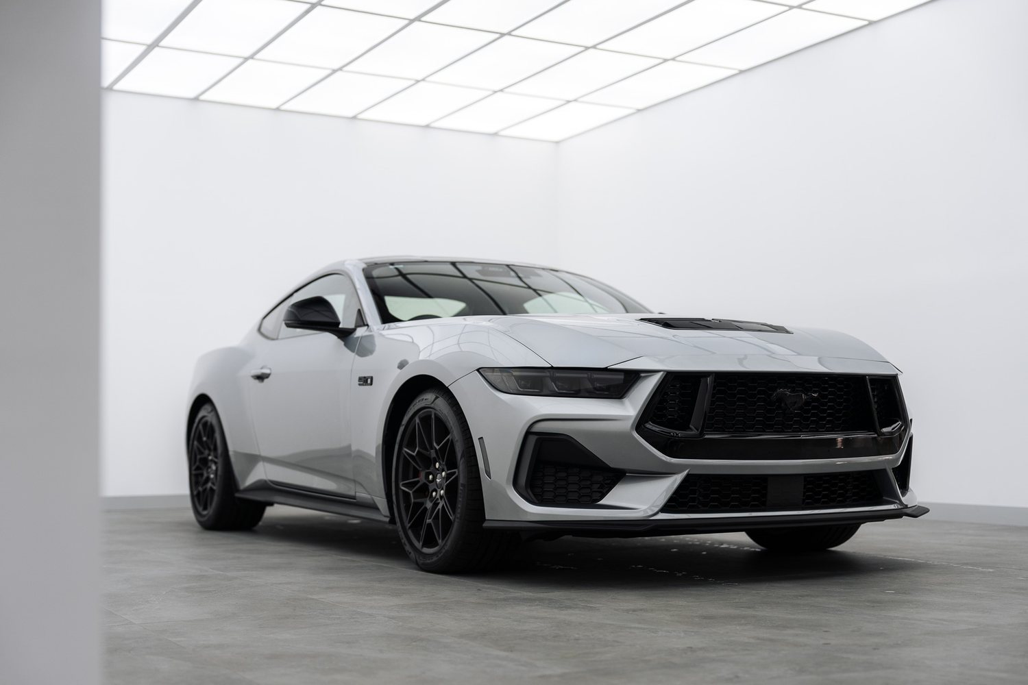 Silver Ford Mustang in the Liquid R studio