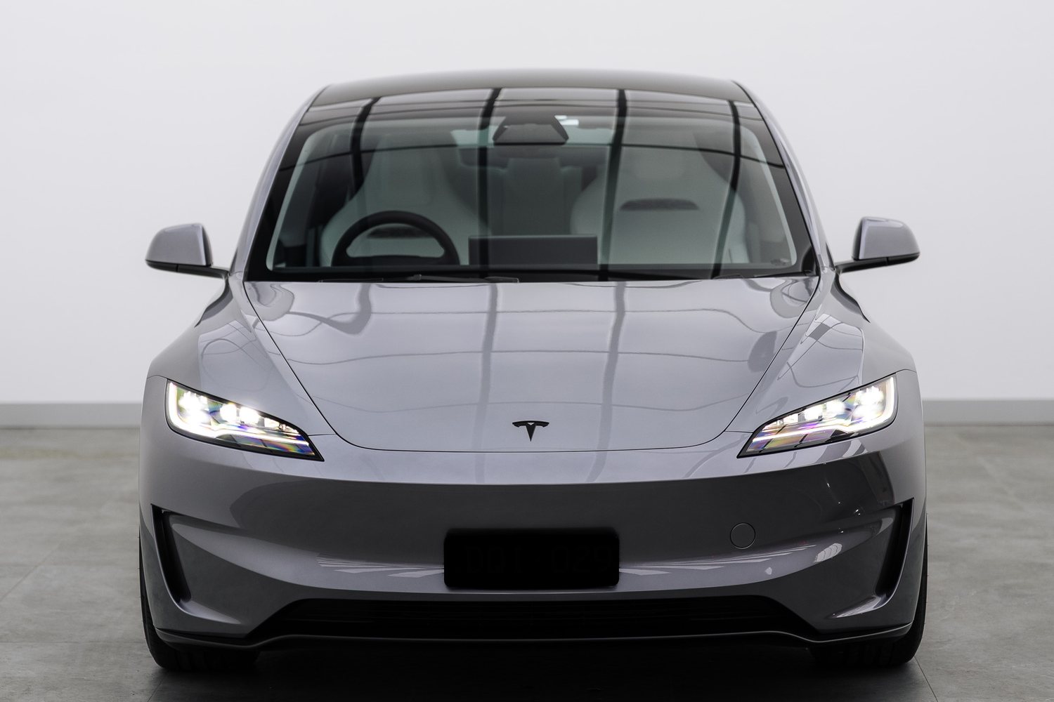 Silver Tesla Model 3 in the Liquid R studio