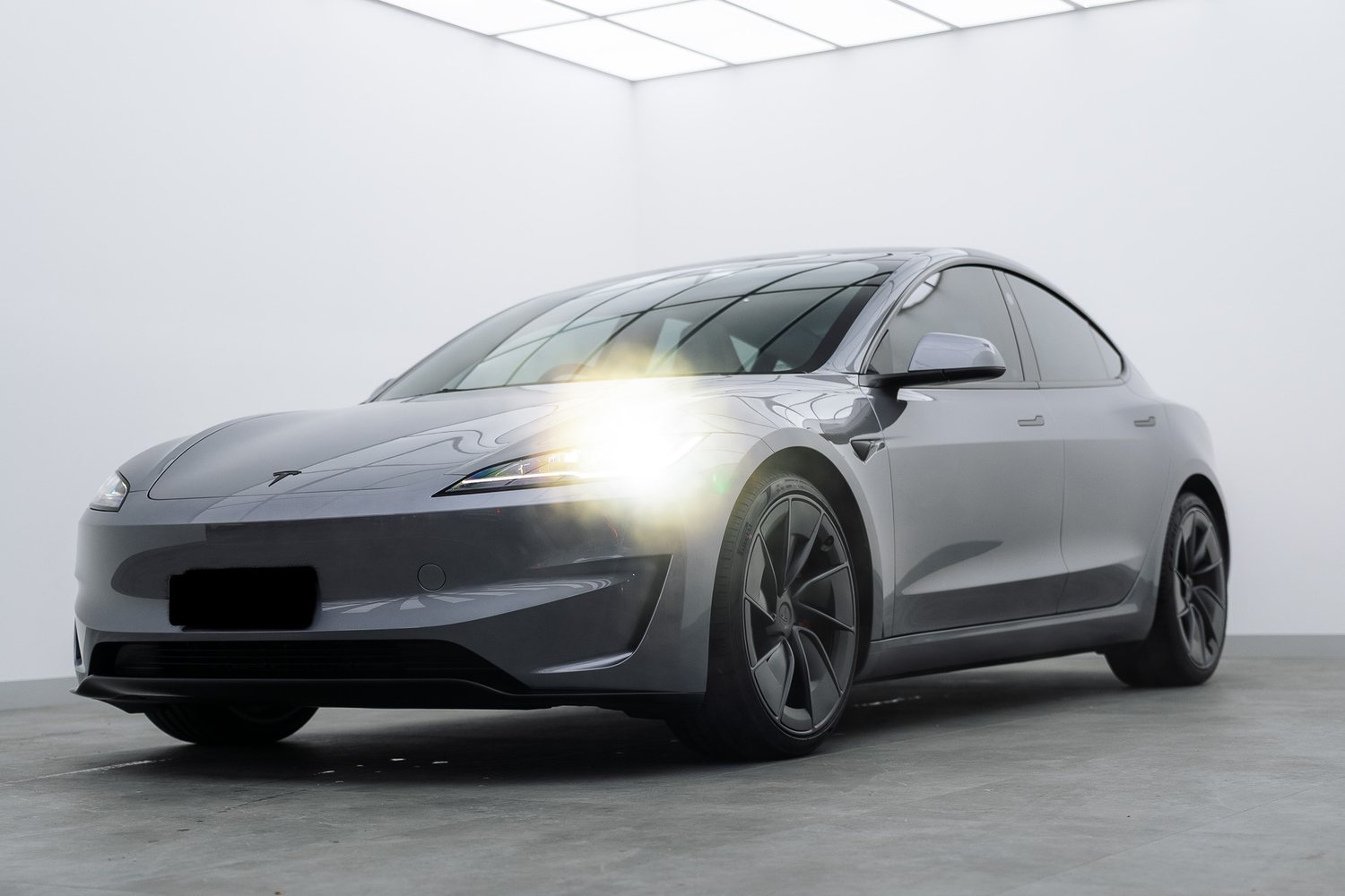 Silver Tesla Model 3 in the Liquid R studio