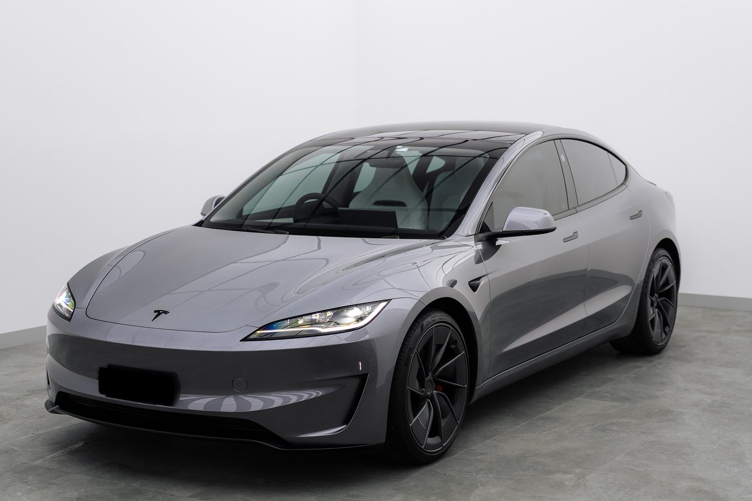 Silver Tesla Model 3 in the Liquid R studio
