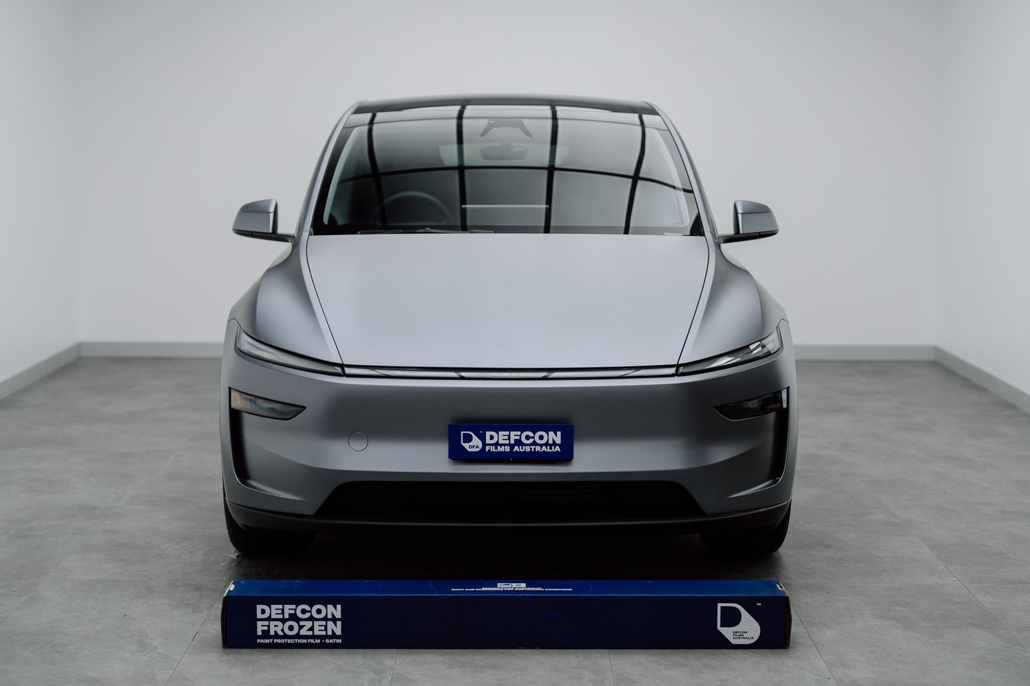 Tesla Model Y in matte PPF in the Liquid R studio