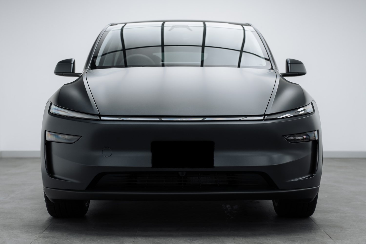 Tesla Model Y in satin PPF in the Liquid R studio