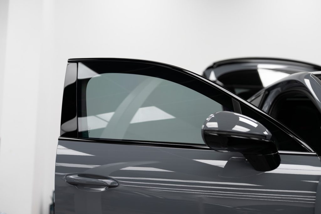 Grey car with tinted front window