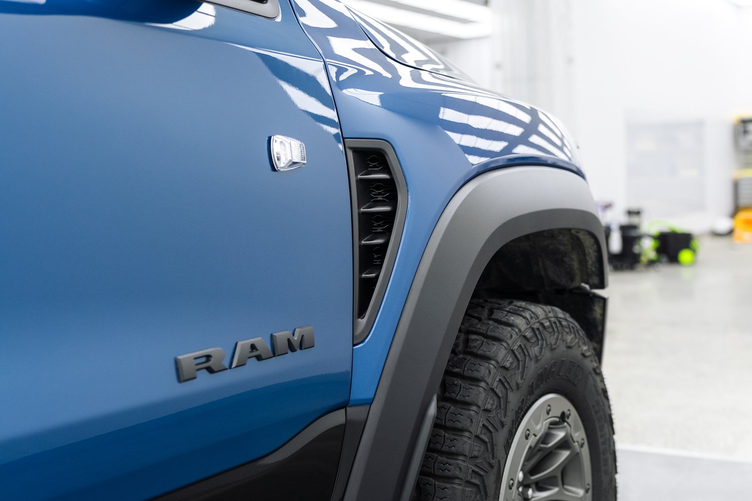 Wheel of a blue RAM TRX