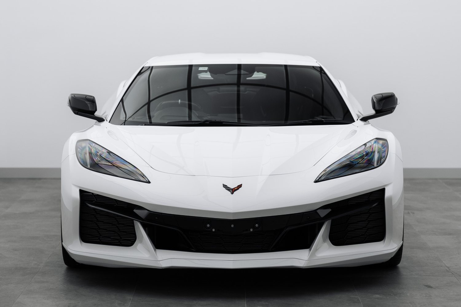 White Chevrolet Corvette in the Liquid R studio