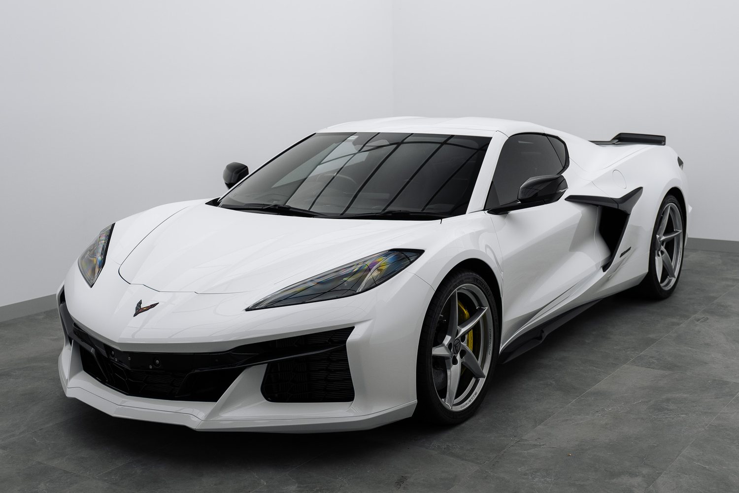 White Chevrolet Corvette in the Liquid R studio