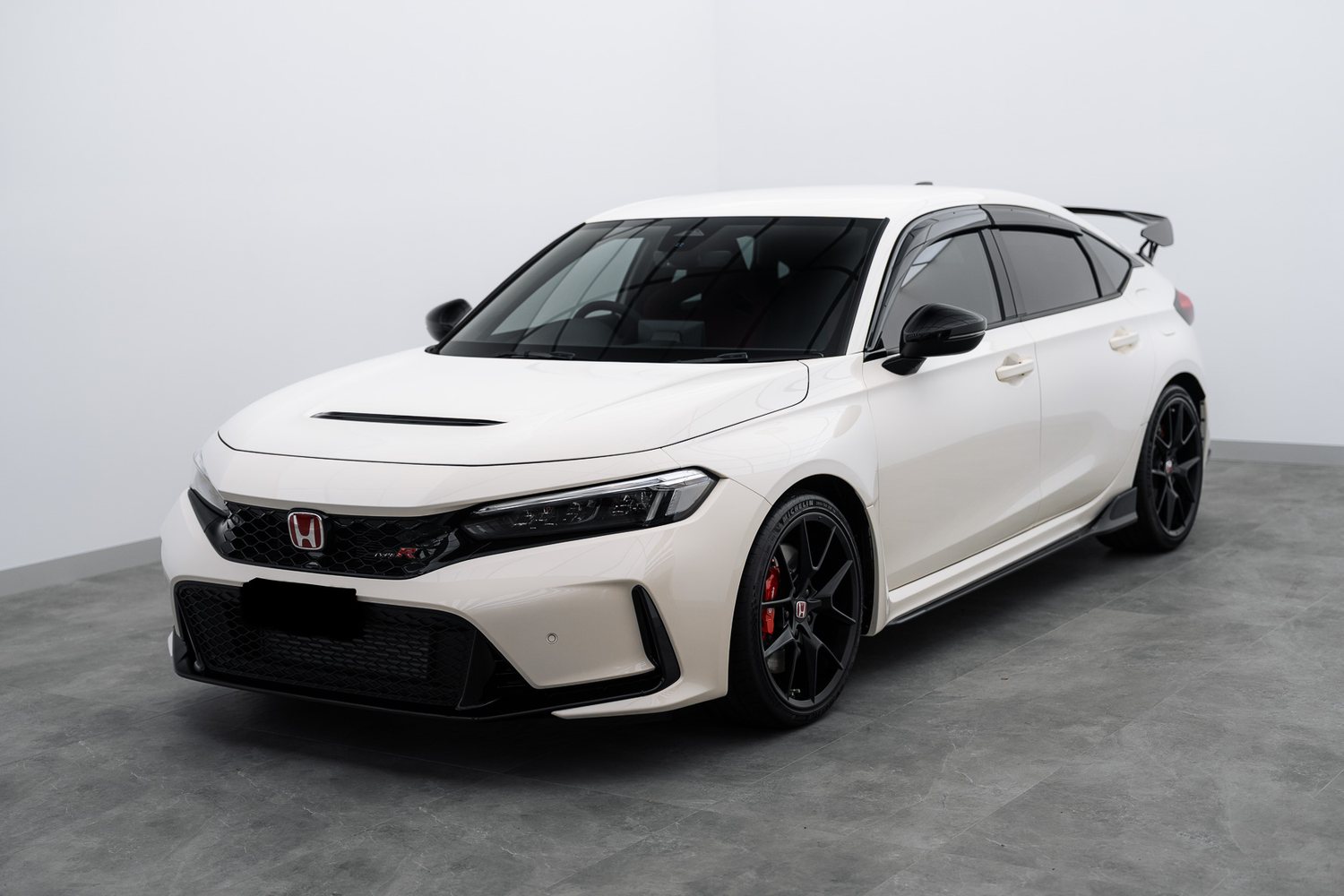 White Honda Civic Type R in the Liquid R studio