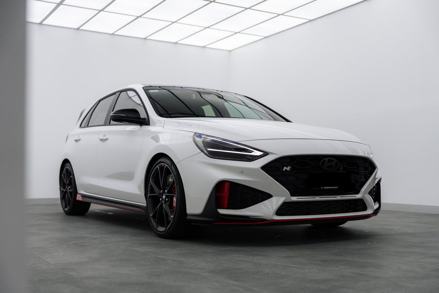 White Hyundai i30 N in the Liquid R studio