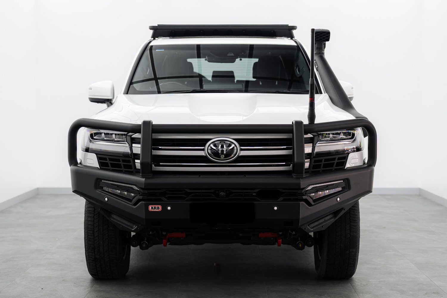 White Toyota LandCruiser with Bushwrapz in the Liquid R studio