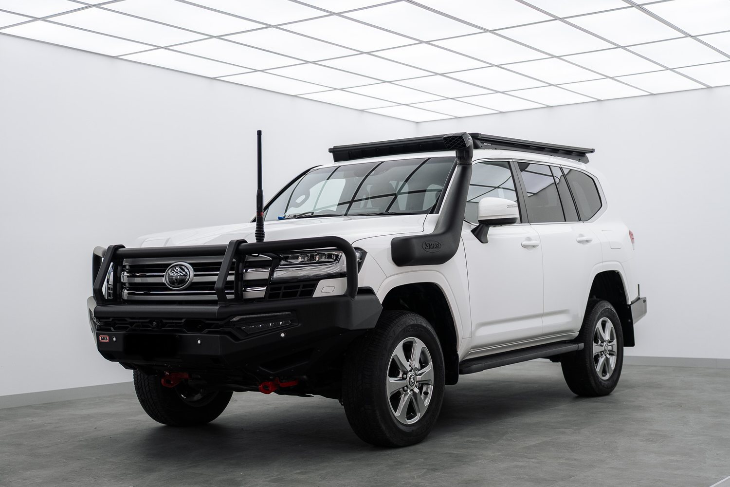 White Toyota LandCruiser with Bushwrapz in the Liquid R studio