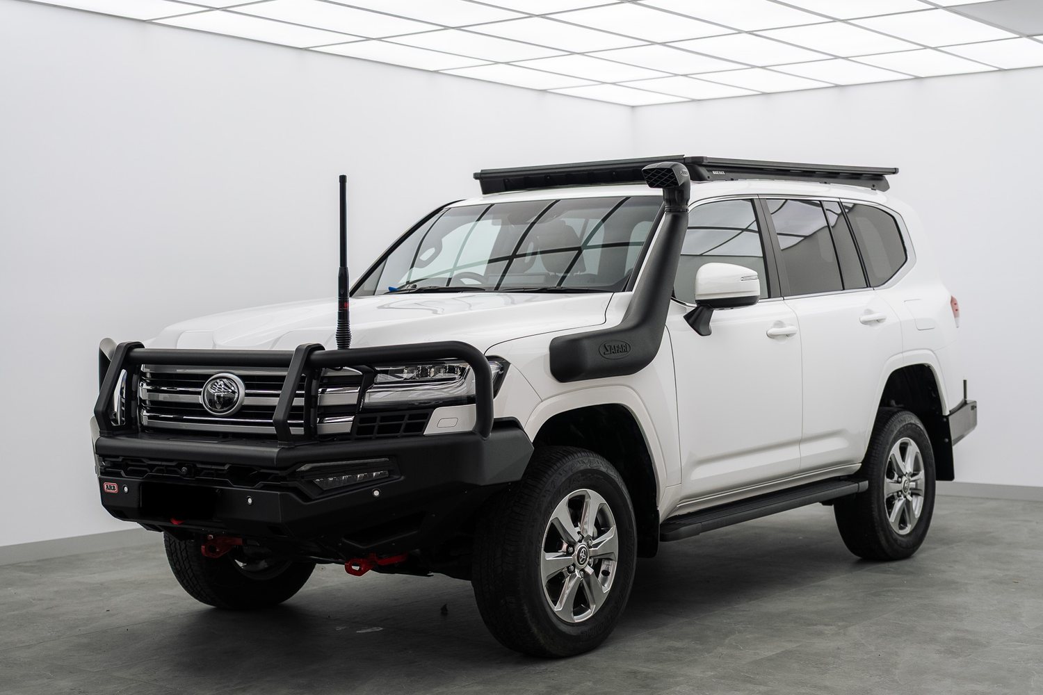 White Toyota LandCruiser with Bushwrapz in the Liquid R studio